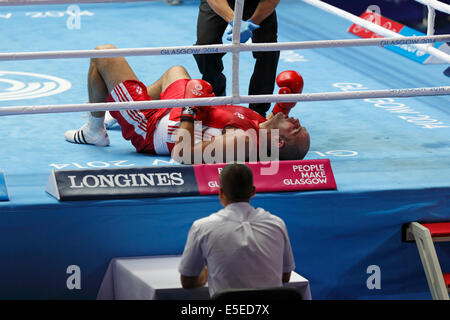 SECC, Glasgow, Écosse, Royaume-Uni, mardi, 29 juillet 2014. Match de boxe finale du quart de 91kg Super Heavyweight des hommes aux Jeux du Commonwealth de 2014 à Glasgow. Ross Henderson d'Écosse sur la toile Banque D'Images