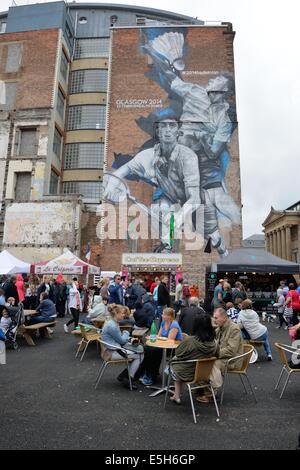 Merchant City festival et peinture murale représentant les 2014 Jeux du Commonwealth de Glasgow Banque D'Images