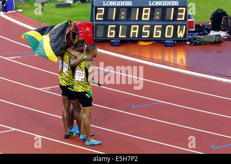 Hampden Park, Glasgow, Écosse, Royaume-Uni, jeudi, 31 juillet 2014. Rasheed Dwyer, Warren Weir et Jason Livermore après avoir remporté respectivement l'or, l'argent et le bronze pour la Jamaïque lors de la finale hommes de 200 m aux Jeux du Commonwealth de Glasgow en 2014 Banque D'Images