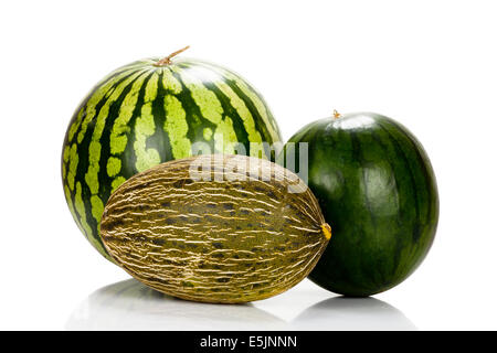 Trois différentes variétés de melons en miroir et isolé sur fond blanc Banque D'Images