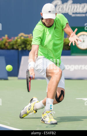 Toronto, Canada. 07Th Août, 2014. Kevin Anderson renvoie un servir pendant son match contre Stan Wawrinka durant la Coupe Rogers 2014 joué à Toronto le 7 août 2014. Anderson a ensuite battu Wawrinka 7-6, 7-5. Credit : Mark Spowart/Alamy Live News Banque D'Images