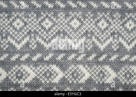Libre de mailles tricotées avec fond gris et blanc, motif géométrique Banque D'Images
