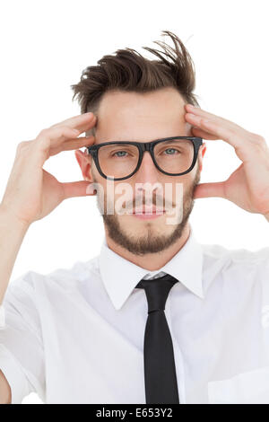 Homme d'avoir un mal de tête nerdy Banque D'Images