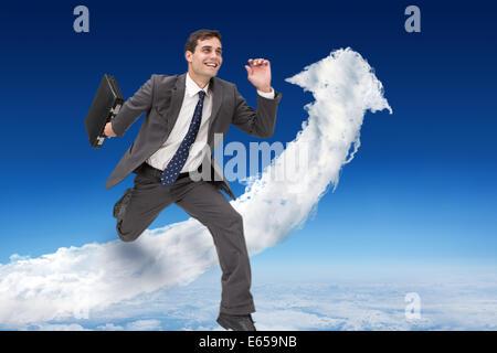 Image composite de cheerful businessman with briefcase Banque D'Images