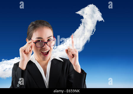 Image composite de young businesswoman getting une idée Banque D'Images