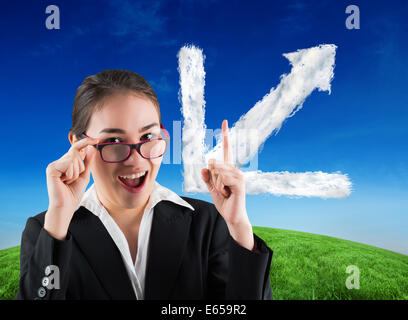 Image composite de young businesswoman getting une idée Banque D'Images