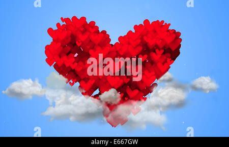 Amour rouge forme particules sur le fond bleu ciel Banque D'Images