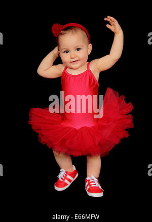 Photo D Un Joli Bebe Avec Une Robe De Danseuse Sur Fond Noir Photo Stock Alamy