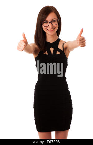 Young woman showing thumb up isolé sur fond blanc Banque D'Images