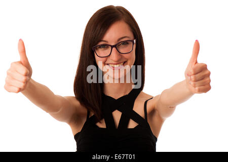 Young woman showing thumb up isolé sur fond blanc Banque D'Images