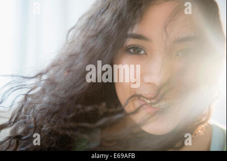 Mixed Race woman smiling Banque D'Images