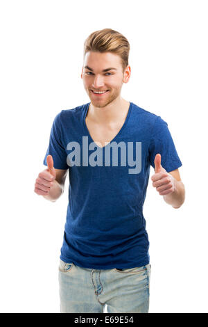 Bon jeune homme avec un sourire et Thumbs up, isolé sur fond blanc Banque D'Images