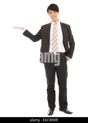 Asian businessman with bienvenue et geste montrant Banque D'Images