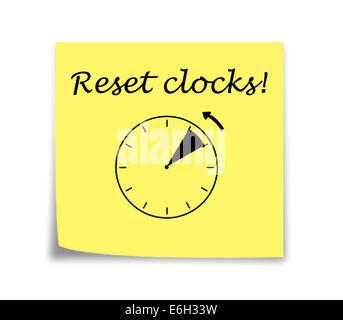 Sticky note rappel pour définir horloges, noir sur jaune Banque D'Images