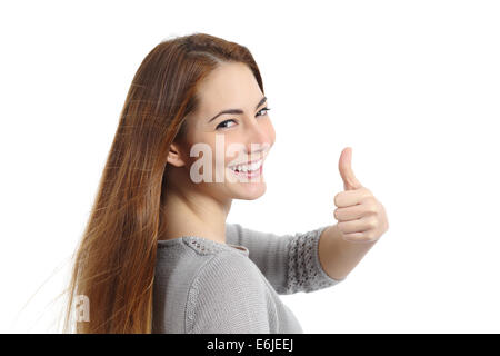 Vue arrière d'une femme heureuse décision thumb up geste isolé sur fond blanc Banque D'Images