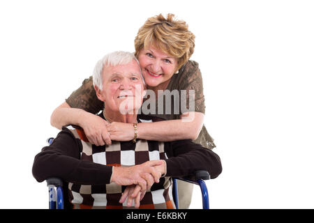 Personnes âgées handicapés soutien femme serrant mari isolated on white Banque D'Images