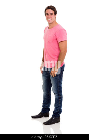 Vue latérale du casual young man on white background Banque D'Images