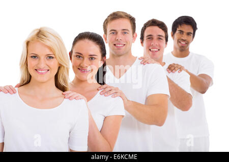 Groupe d'amis belle standing in a row over white background Banque D'Images