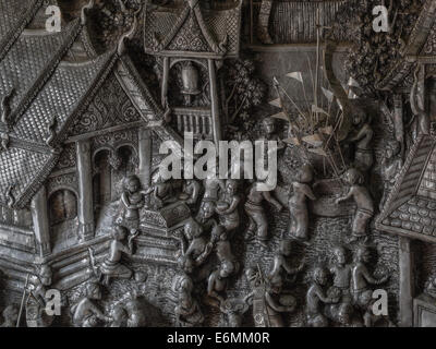 Metal relief à Wat Saen Muen Temple, Chiang Mai, Thaïlande. Banque D'Images