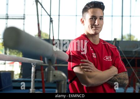 Stuttgart, Allemagne. 20e Août, 2014. La gymnaste artistique allemande Marcel Nguyen pose dans le forum de gymnastique artistique à Stuttgart, Allemagne, 20 août 2014. Photo : Sebastian Kahnert/dpa/Alamy Live News Banque D'Images