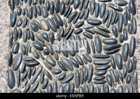 Pebble stone texture sur tapis roulant Banque D'Images