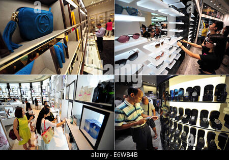 (140901) -- SANYA, le 1 septembre, 2014 (Xinhua) -- Combo photo prise le 1 septembre 2014 montre que les personnes faisant du shopping au Sanya Haitang Bay International Shopping Mall à Sanya, province de Hainan en Chine du sud. Le centre commercial qui a ouvert ses portes le lundi est le plus grand duty free shop (DFS) avec un quartier d'affaires de quelque 72 000 mètres carrés. Les boutiques duty-free dans les deux magasins DFS de Hainan en 2013, Hit 3,29 milliards de yuans (530,6 millions de dollars américains), en hausse de 40 pour cent d'année en année. (Xinhua/Guo Cheng) (WF) Banque D'Images