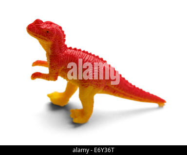 Dinosaure rouge en plastique isolé sur fond blanc. Banque D'Images