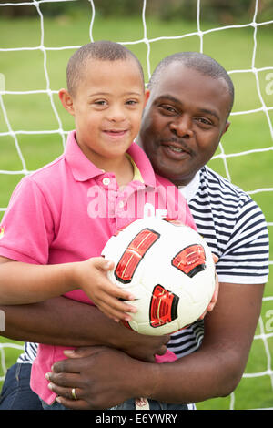 Avec le syndrome de Down Père Fils Banque D'Images