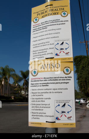 Orange County, Californie, USA. 3 Septembre, 2014. Le Orange County District de contrôle des vecteurs des panneaux affichés dans les quartiers de résidents d'avertissement du danger du virus du Nil occidental les moustiques positifs . Après. Santa Ana) - UN Seal Beach résidant dans son 80s avec des conditions médicales sous-jacentes est décédé la semaine dernière avec des complications de l'infection au virus du Nil occidental. Résultats de test a reçu cette semaine a confirmé l'infection au VNO ; dont elle avait la forme plus grave, maladie neuroinvasive West Nile. Credit : Duncan Selby/Alamy Live News Banque D'Images