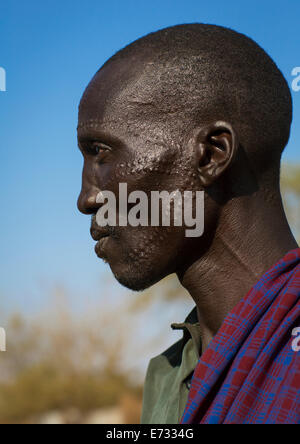 Topossa homme tribu à Scarifications sur son visage, Kangate, vallée de l'Omo, Ethiopie Banque D'Images