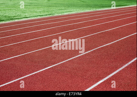 Les pistes de course en caoutchouc du stade Banque D'Images