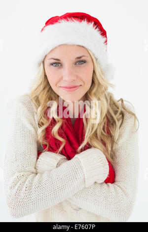 Attractive young woman wearing santa hat Banque D'Images