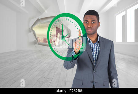 Composite image of businessman pointing Banque D'Images