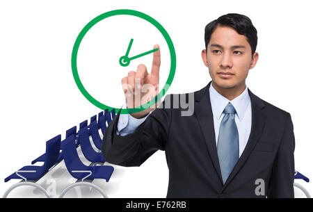 Image composite de stern asian businessman Banque D'Images