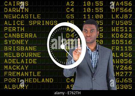 Composite image of businessman pointing Banque D'Images