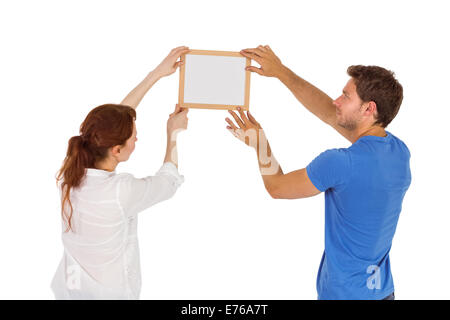 Couple de décider de suspendre photo Banque D'Images