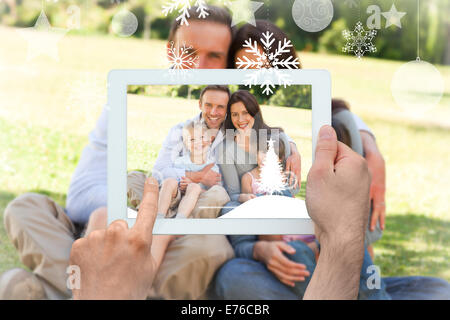 Image composite de hands holding tablet pc Banque D'Images