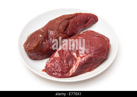 Steaks de viande de kangourou crus isolated on a white background studio. Banque D'Images