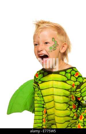 Roaring boy in monster costume dragon Banque D'Images