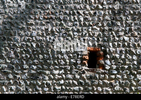 Un mur de pierre qui fait partie d'un bâtiment près de 1 156 km dans l'East Sussex Banque D'Images