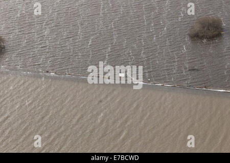 La principale ligne de chemin de fer dans le Somerset près de Bridgwater, Somerset sur les niveaux qui est maintenant complètement sous l'eau à la place. Banque D'Images