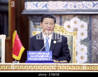 Douchanbé, Tadjikistan. Sep 12, 2014. Le président chinois Xi Jinping participe à la 14e session du Conseil des chefs d'état de l'Organisation de coopération de Shanghai (OCS) à Douchanbé, capitale du Tadjikistan, le 12 septembre 2014. Credit : Ju Peng/Xinhua/Alamy Live News Banque D'Images