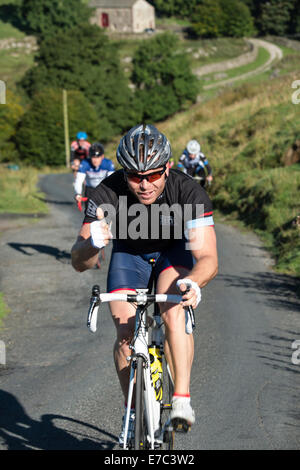 Sir Chris Hoy à vélo dans le Parc National des Yorkshire Dales Banque D'Images