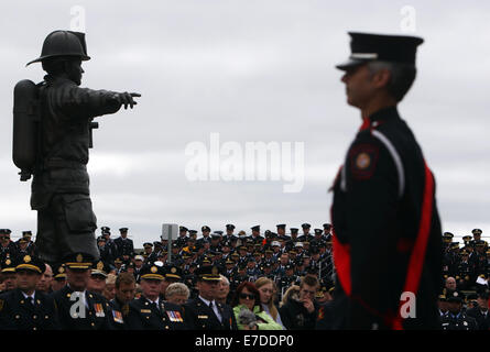 Ottawa, Canada. 14Th Sep 2014. Regardez sur les pompiers à l'pompier, à Ottawa, Canada, le 14 septembre, 2014. L'événement annuel attire des centaines de pompiers de partout au pays pour honorer leurs collègues disparus et voir leur nom ajouté à la désormais 1200 qui ornent le monument. Credit : Cole Burston/Xinhua/Alamy Live News Banque D'Images