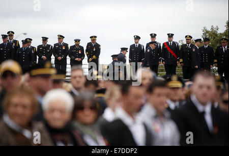 Ottawa, Canada. 14Th Sep 2014. Regardez sur les pompiers à l'pompier, à Ottawa, Canada, le 14 septembre, 2014. L'événement annuel attire des centaines de pompiers de partout au pays pour honorer leurs collègues disparus et voir leur nom ajouté à la désormais 1200 qui ornent le monument. Credit : Cole Burston/Xinhua/Alamy Live News Banque D'Images