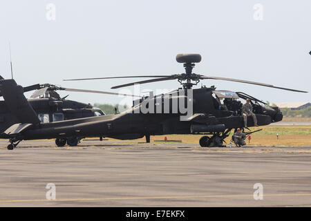 Semarang, Indonésie. 15 Sep, 2014. Les hélicoptères militaires prendre part au cours de la 8e exercice conjoint Garuda Shield 2014 à la base aérienne de l'armée à l'aéroport d'Ahmad Yani de Semarang, Central Java, Indonésie. Garuda Shield est le mot de passe de l'exercice mené conjointement par l'armée indonésienne et de l'armée américaine et a eu lieu du 01 septembre au 29 septembre 2014 à Semarang et Asembagus, Situbondo, Indonésie. Sihardian Crédit : WF /Pacific Press/Alamy Live News Banque D'Images