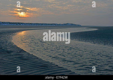 Coucher du soleil dans la mer des Wadden, Langeoog, Frise orientale, Basse-Saxe, Allemagne Banque D'Images