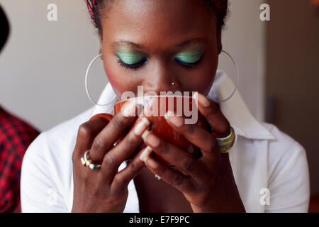 Woman in cafe Banque D'Images