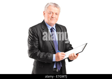 Mature businessman taking notes sur bout de papier isolé sur fond blanc Banque D'Images