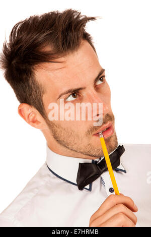 Closeup portrait of young man with pencil isolated over white background Banque D'Images